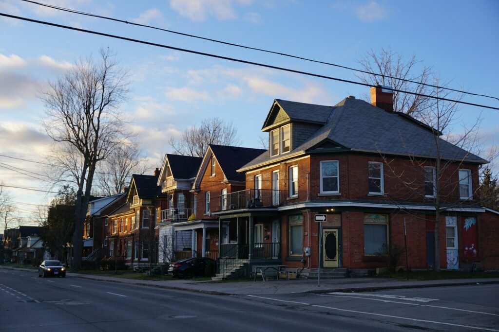 A row of houses on a street corner
